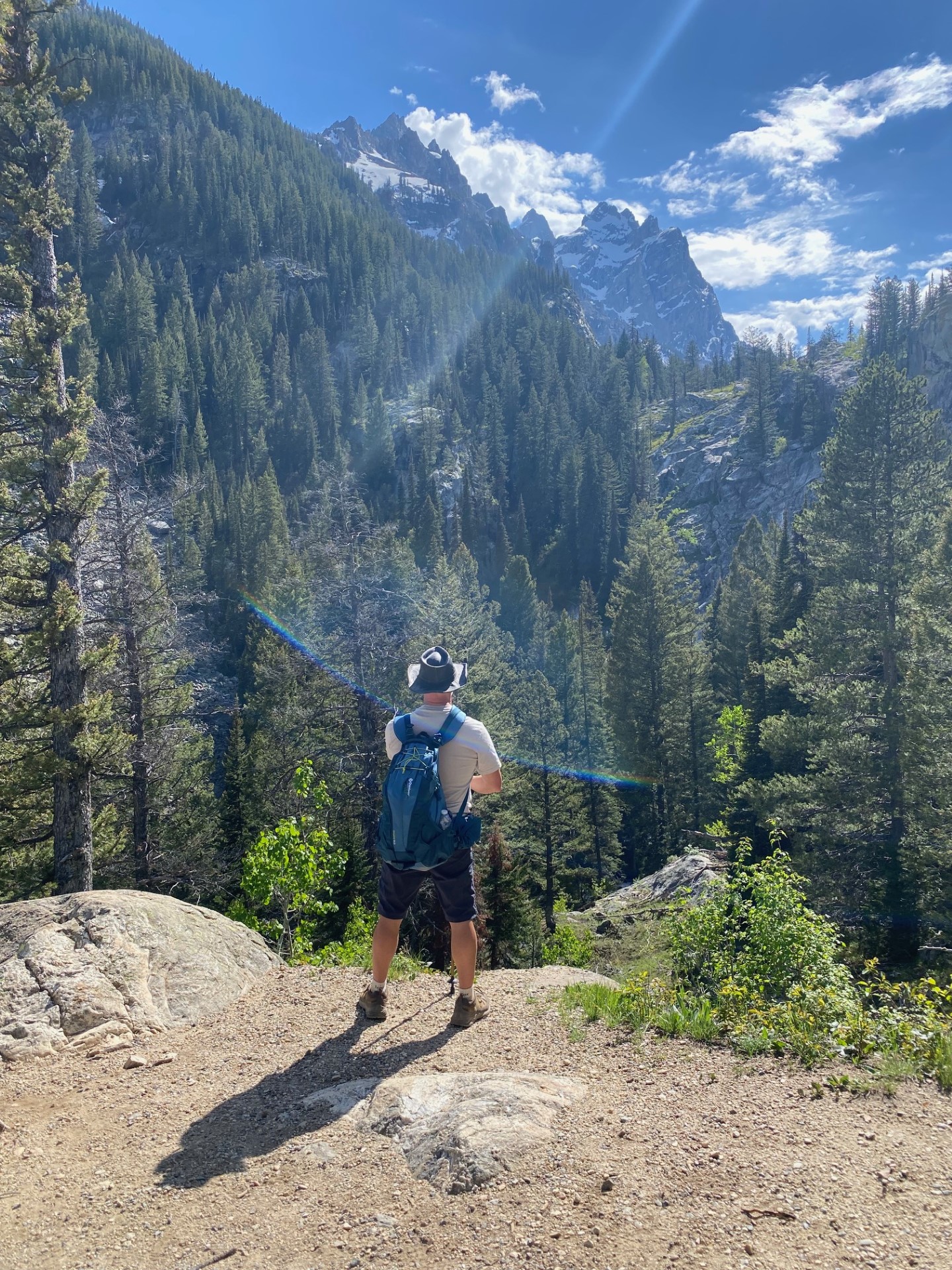 Cliff in the Tetons on hike with backpack