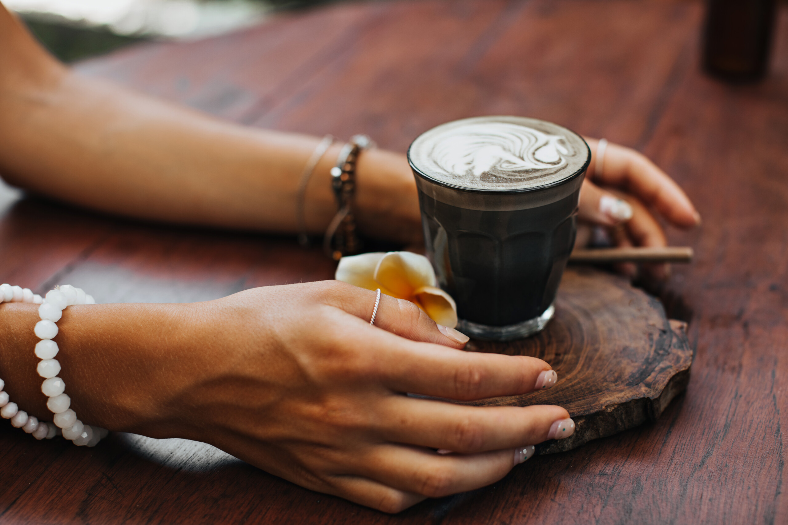 hands holding coffee